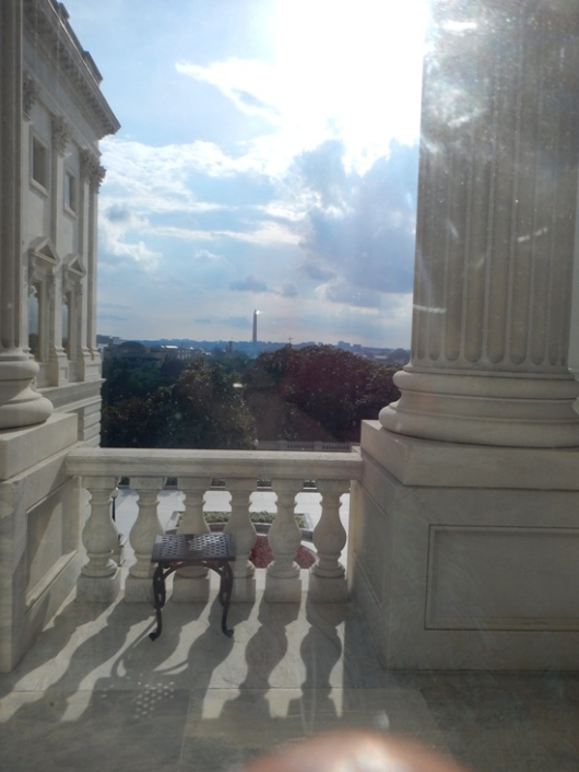 Washington Monument through Capitol window